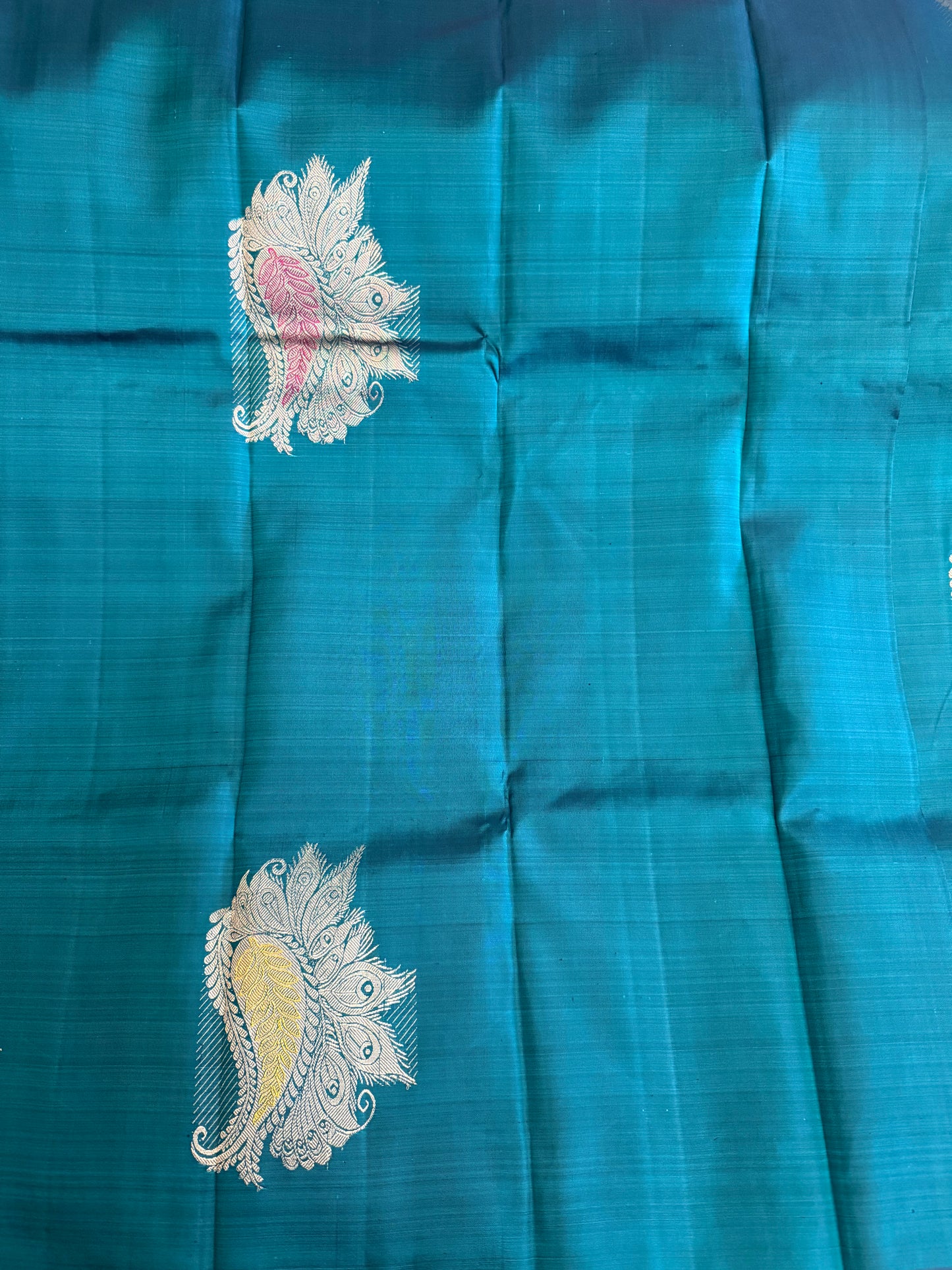 Handloom Teal Blue Silk Kanjeevaram saree with Gold & Silver Peacock Motif