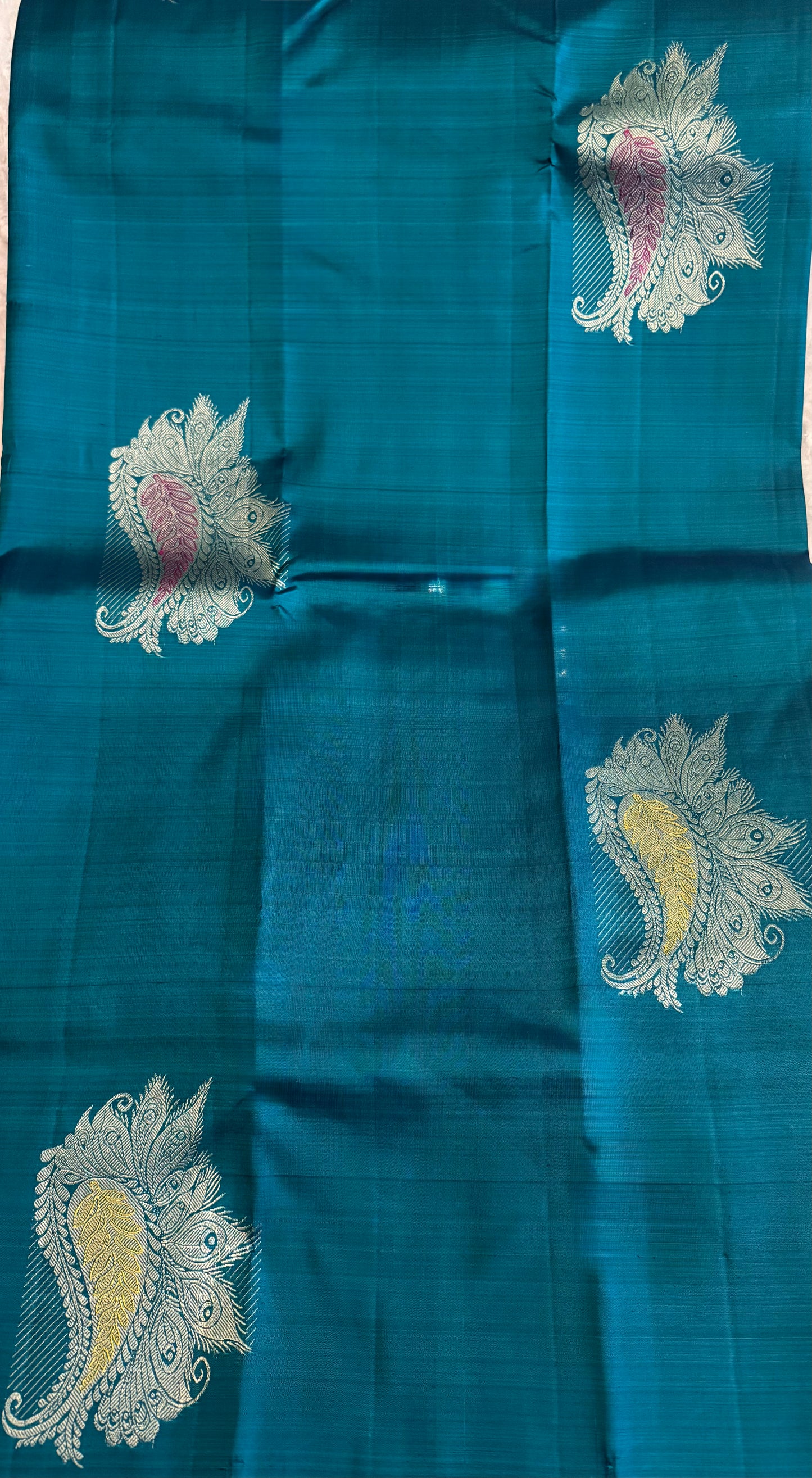 Handloom Teal Blue Silk Kanjeevaram saree with Gold & Silver Peacock Motif