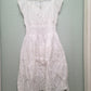 Full-Length Sleeveless White Dress with Stylish Embroidery